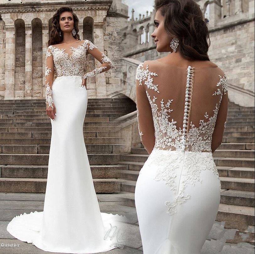 Une robe sirène avec perles blanches