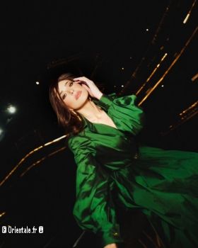 Abeer Nehme en robe verte